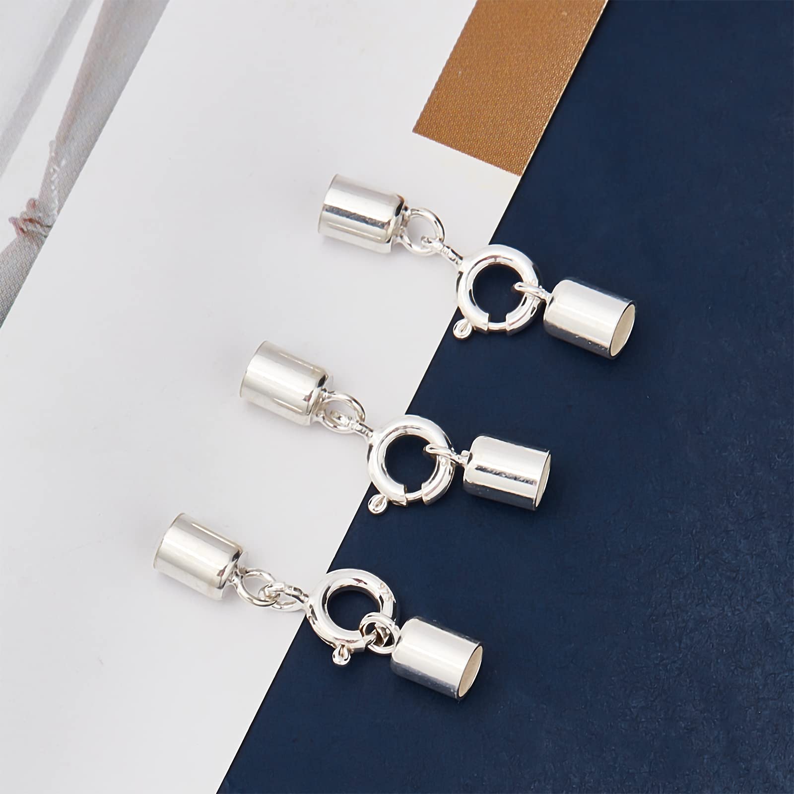 Lobster clasps with end cap eyelet