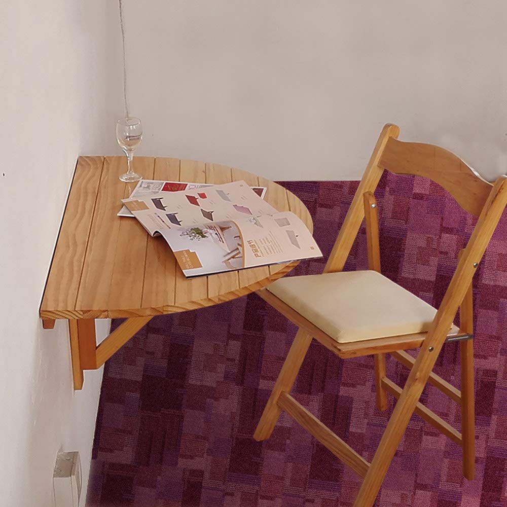 Table pliante murale en bois massif pour aménager un coin repas sur le balcon