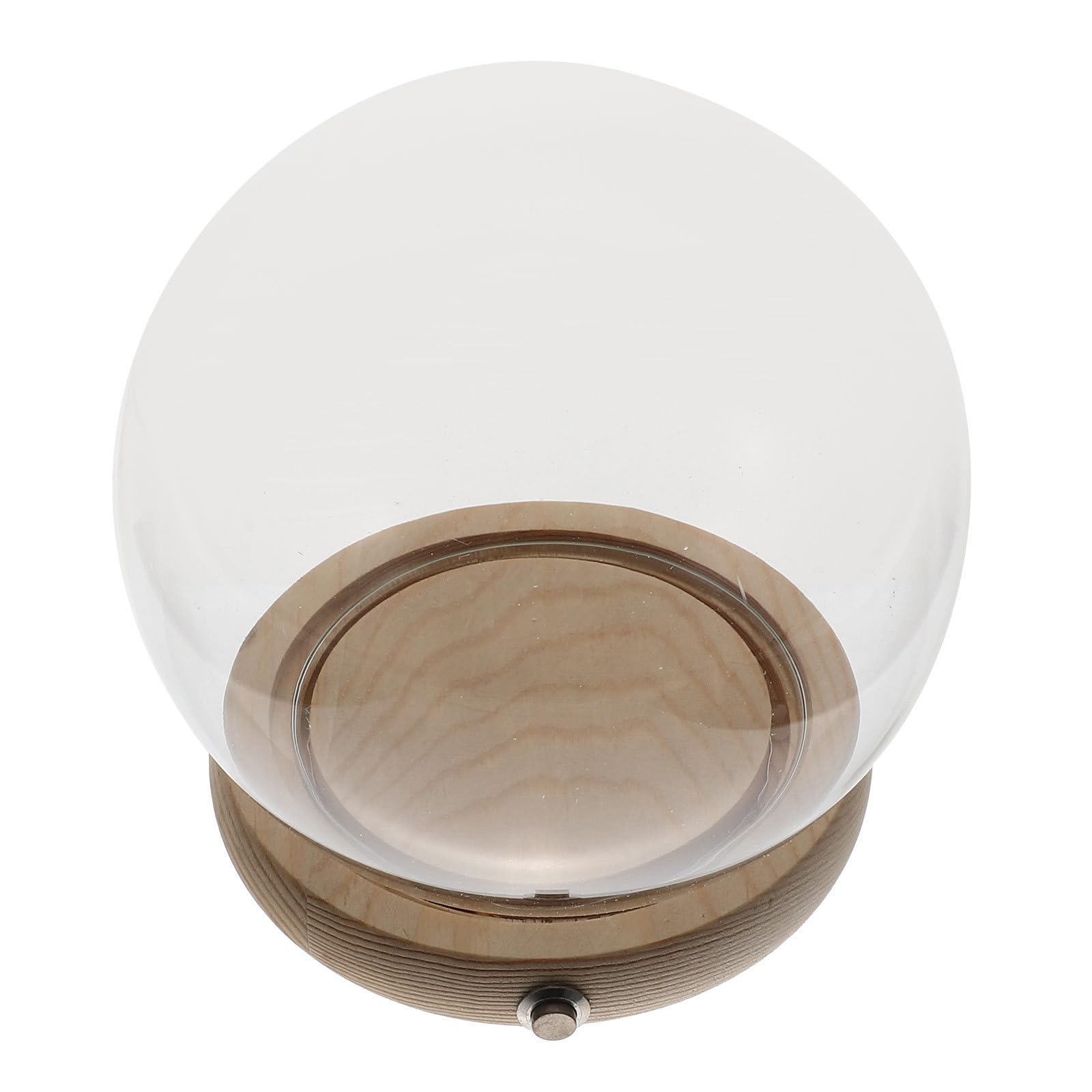Detalle romántico de cubierta de vidrio con base de madera iluminada para regalar en ocasiones