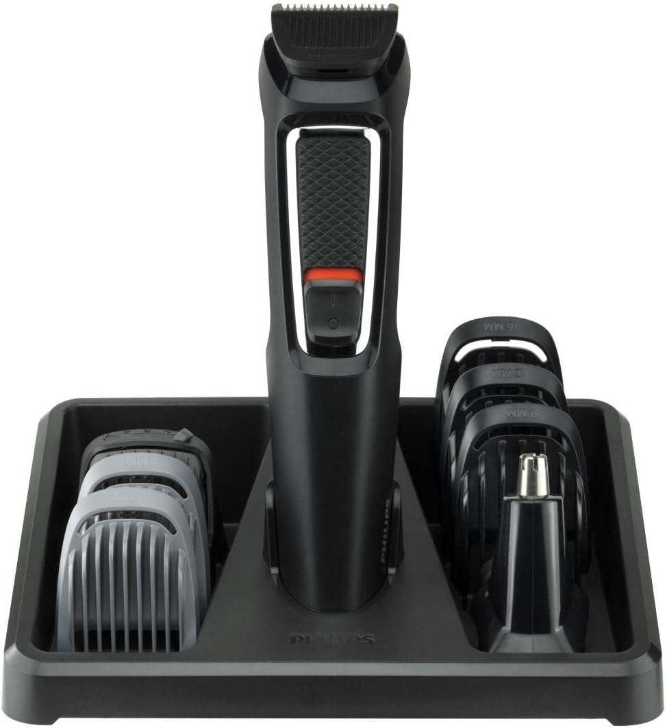 Philips Multigroom trimmer in its black storage stand with all combs and nose trimmer neatly organized