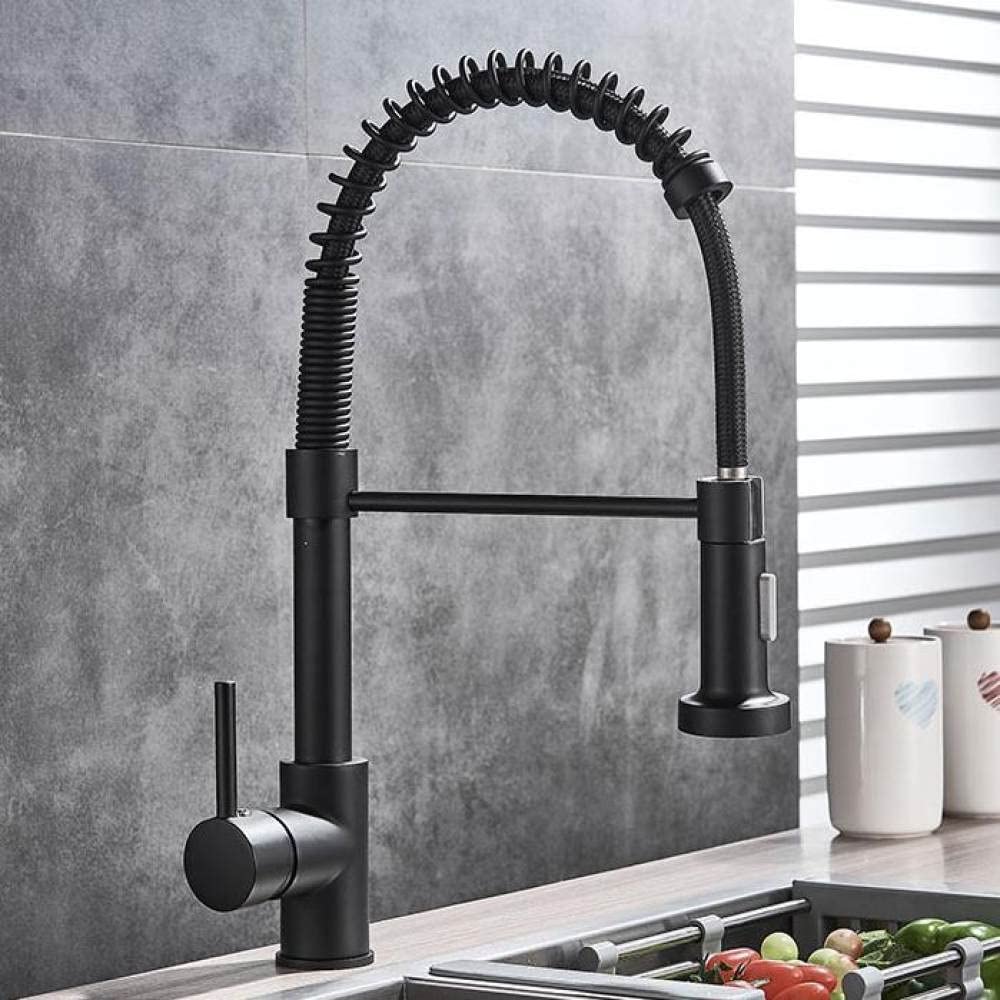 Mitigeur à douchette amovible noir et or pour simplifier la vaisselle au quotidien