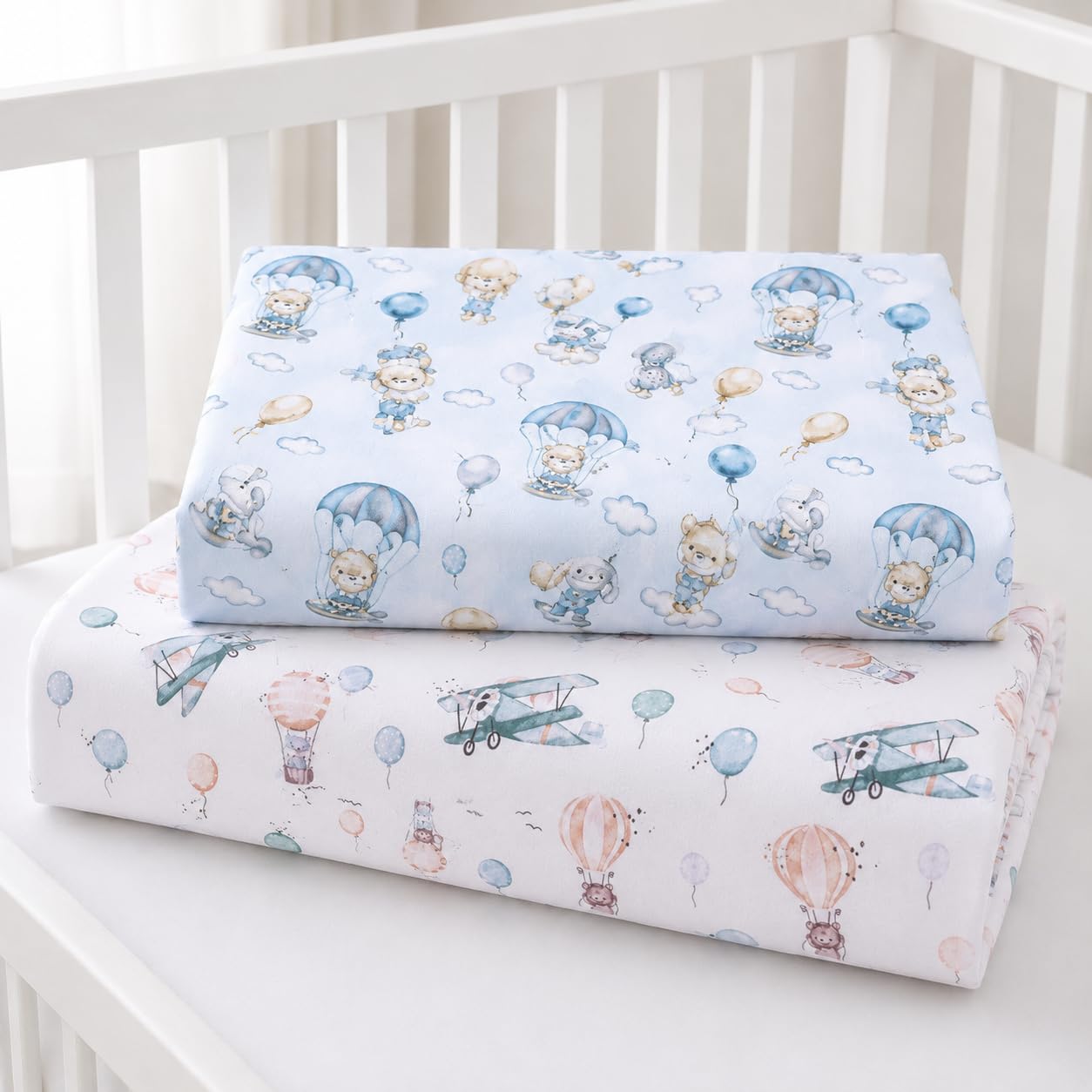 BABYMAM 2 Pack 100% Cotton Printed Fitted Cot Bed Sheets 120x60 cm Soft Breathable Elasticated Baby Cot Sheets Assorted Designs, Dreamy flight & Walk in the clouds