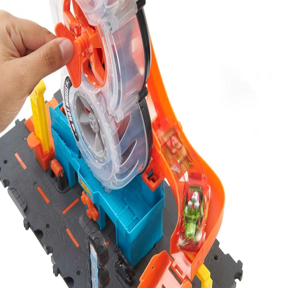 Hot Wheels City Super Twist Tire Shop - Taller con Rueda Gigante - Incluye Coche - Compatible con Conjuntos Hot Wheels - Regalo para Niños de 4-8 Años, HDP02