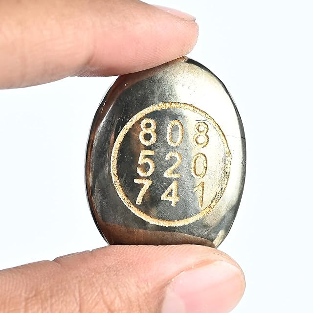 Foto 2 de 5 de Moneda magnética con símbolo de pirita de piedra Zibu