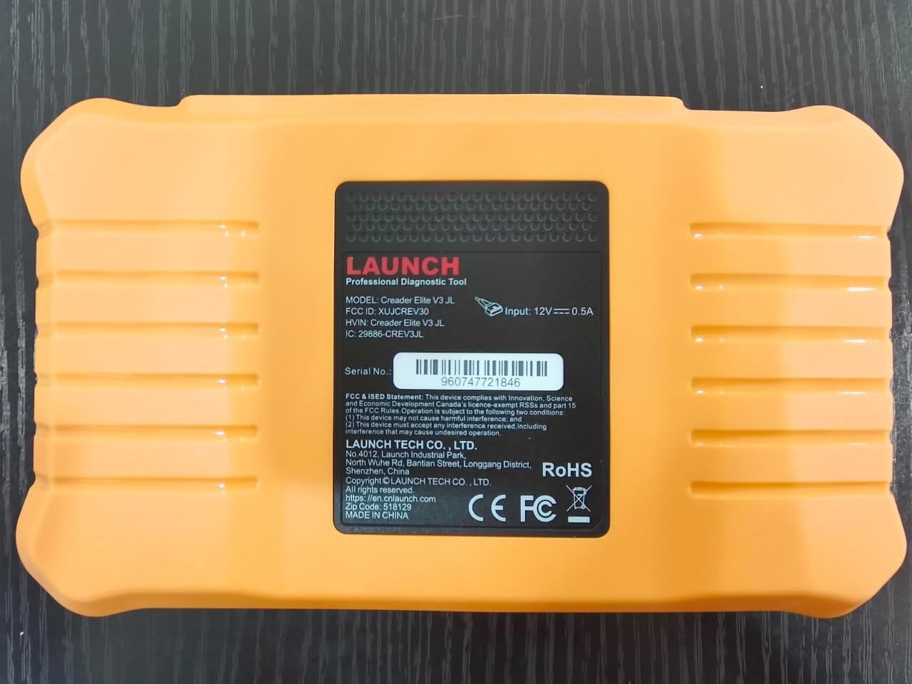 Geri view of the LAUNCH Creader Elite V3.0 device showing serial number and regulatory information