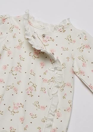 The Little Me baby-girls Footie and Hat set feature a one-piece footed sleeper and a matching hat. Made with utmost care, the footie is designed to keep your baby snug and cozy. The footie is carefully stitched to provide ample room for movement while ensuring a secure fit. The enclosed footies, with their soft fabric, keep your baby's feet warm and protected at all times.