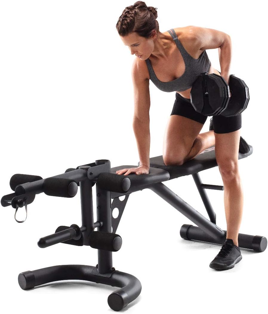 Person performing a single-arm dumbbell row on the workout bench