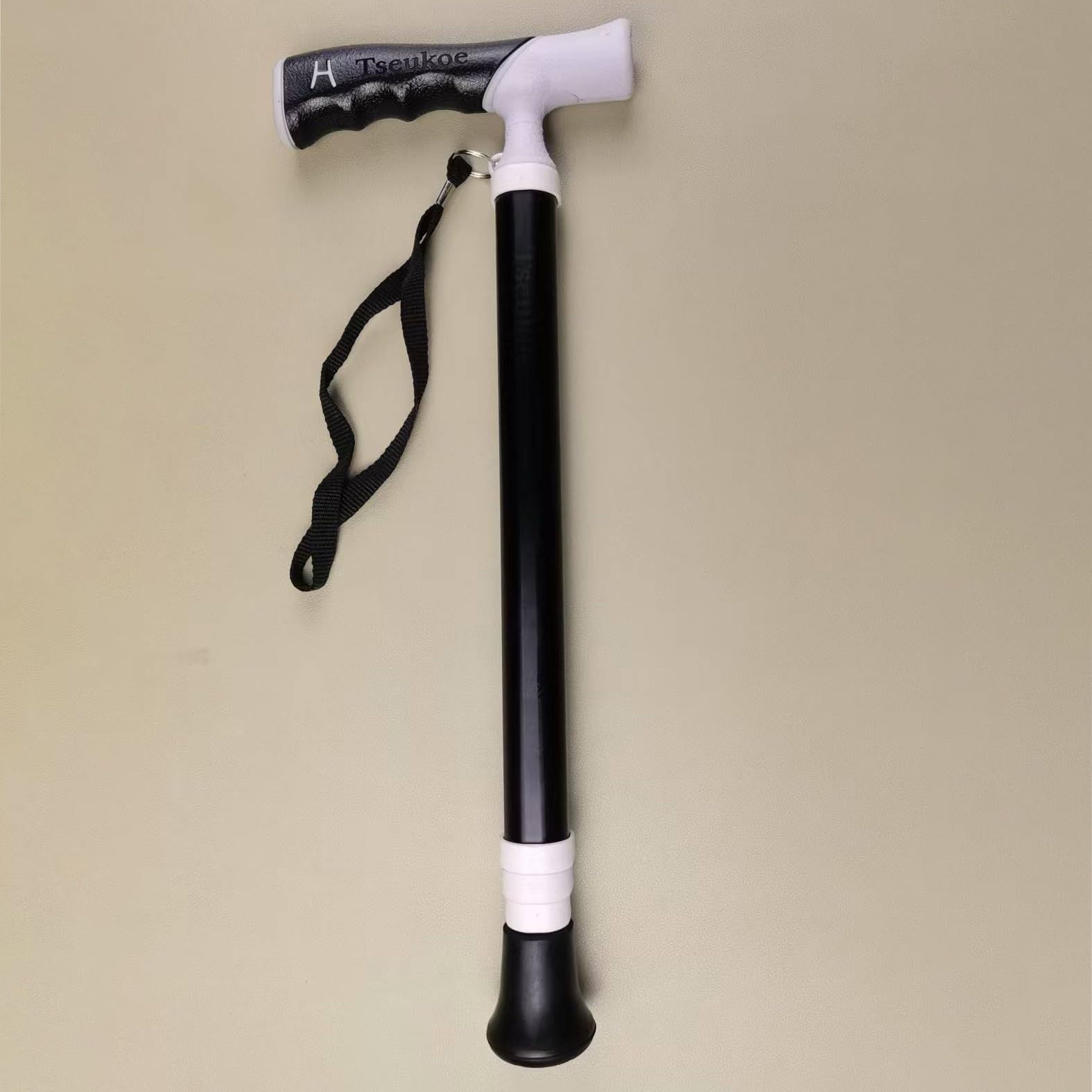 Bastone Bianco, Bastone da Passeggio Pieghevole for Uomo e Donna. Impugnatura Regolabile, ergonomica Confortevole, Base con Punta a Quattro Punte Perno