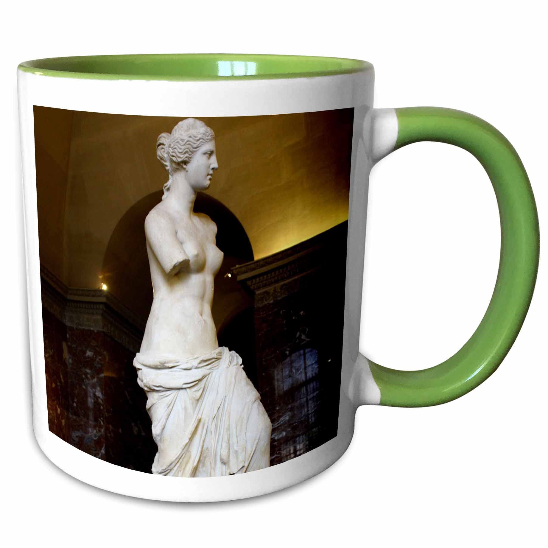 The lovely Venus de Milo statue which is still admired by all in the Louvre 11oz Two-Tone Green Mug