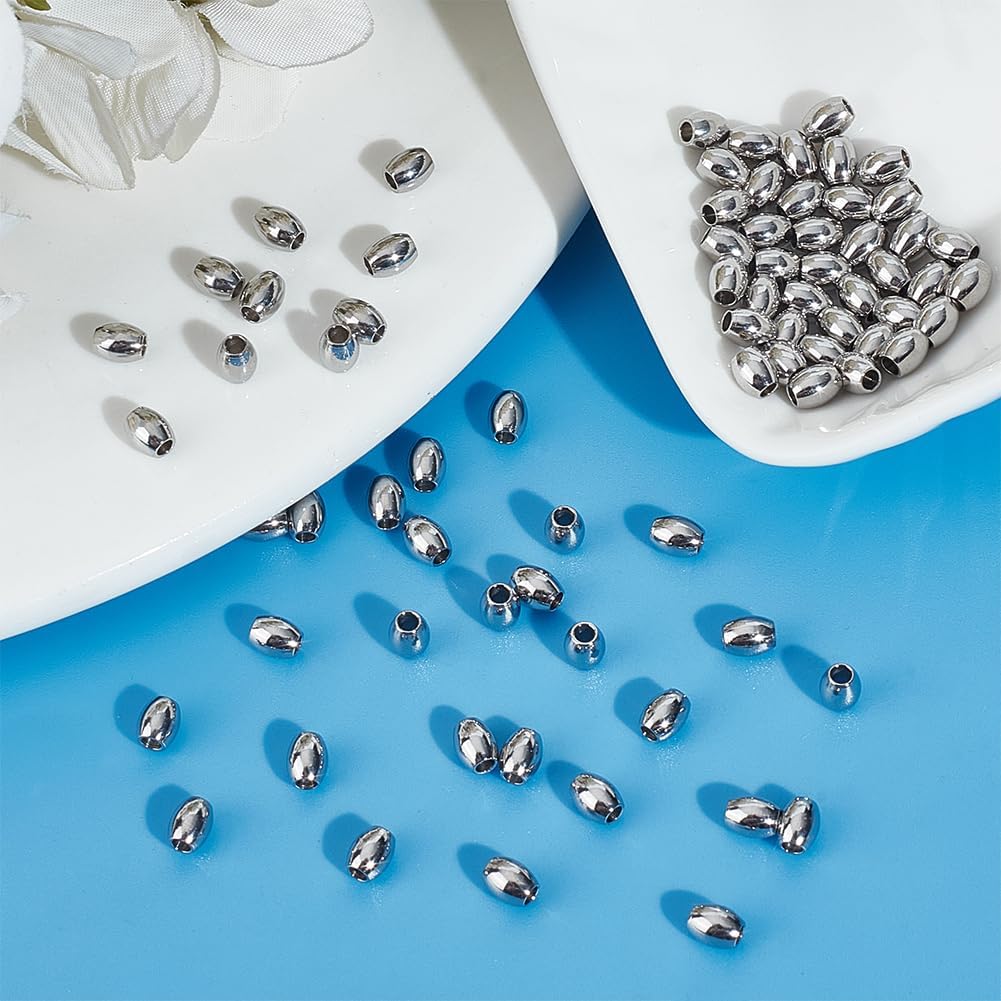 UNICRAFTALE 80Pcs Stainless Steel Barrel Beads Stainless Steel Loose Beads 2mm Small Hole Round Beads Metal Hollow Ball Beads Parachute Cord Bead Finding for Jewelry Making 5x4mm, 6x6mm - Image 2