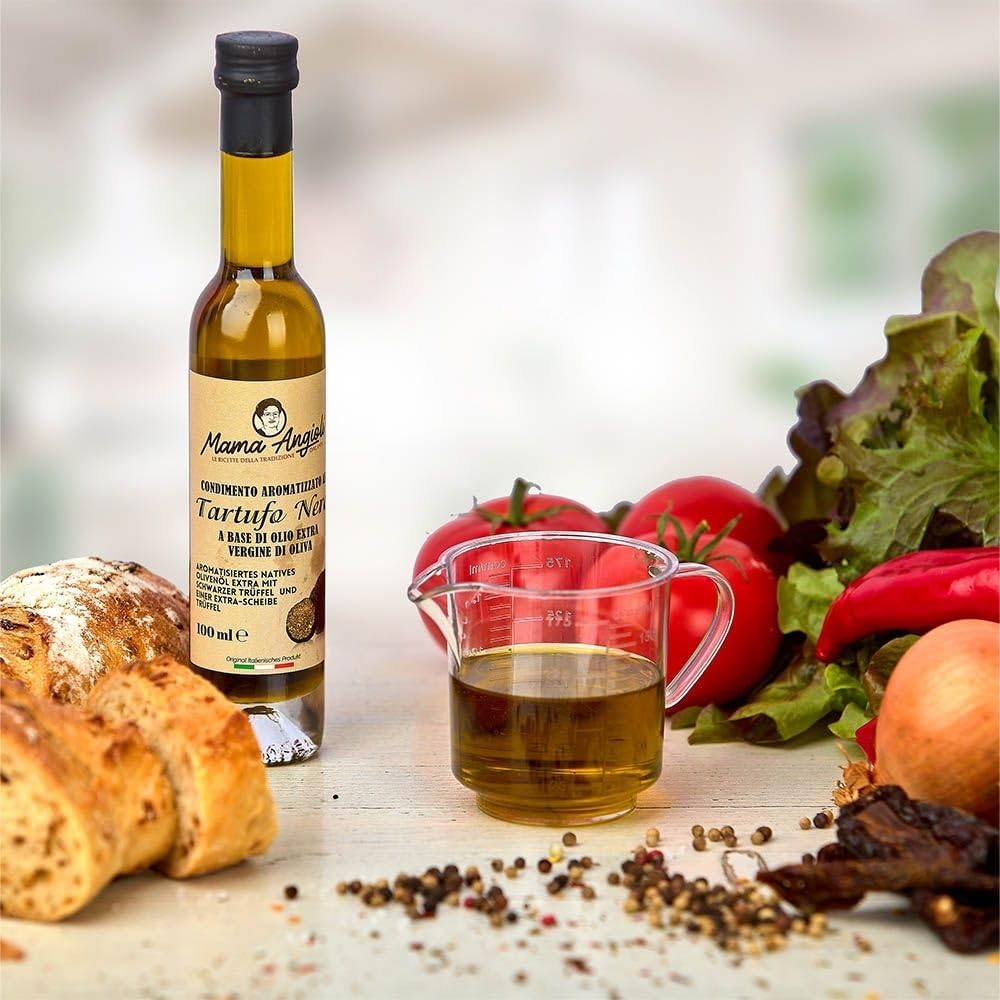 Trüffelöl mit echtem Trüffel Mama Angioli 100ml. Aus nativem Olivenöl extra vergin Für Saucen und zum Verfeinern von Gerichten mit extra Trüffel Scheibe Für Vegane und Glutenfreie Gericht geeignet