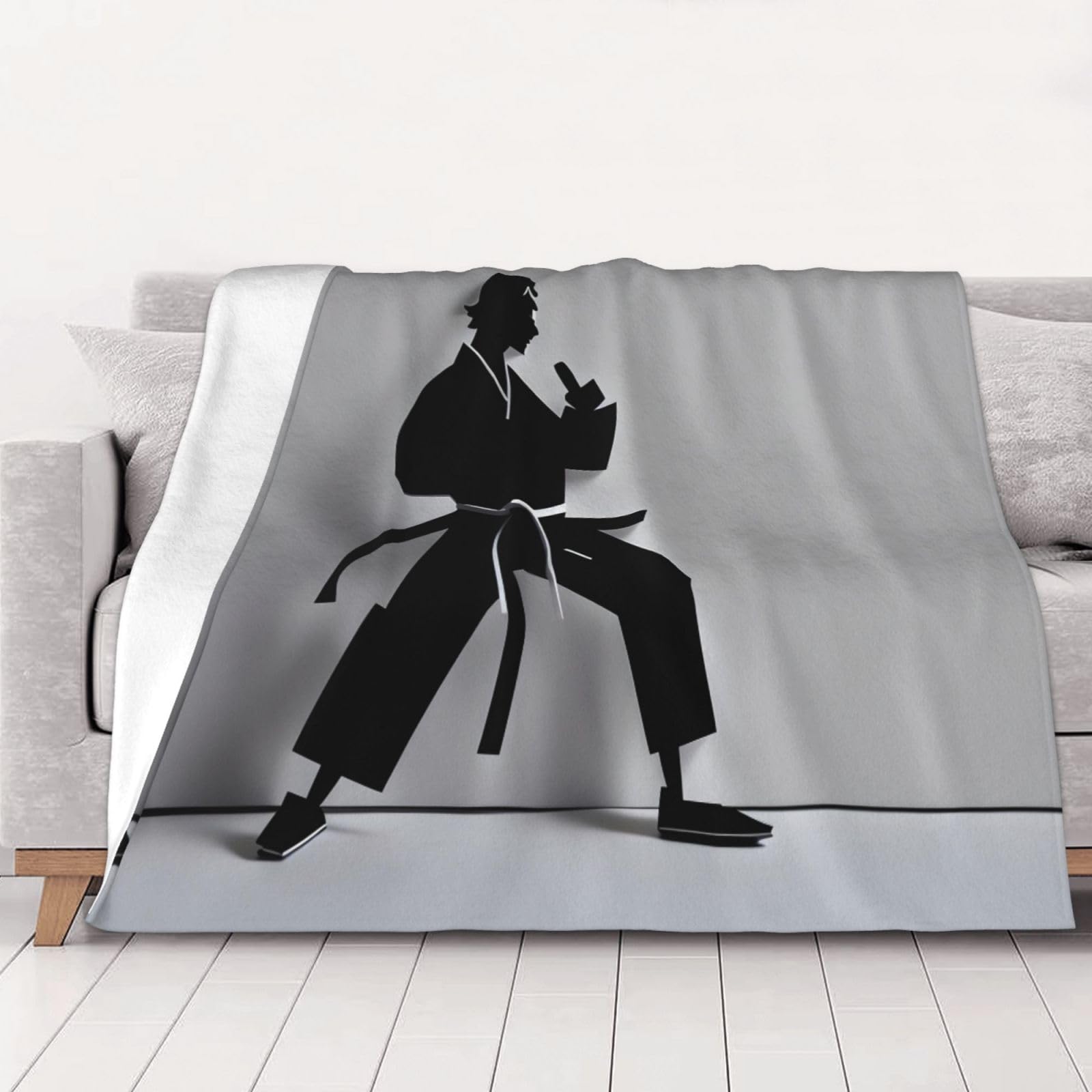 Couverture karaté ultra douce pour des soirées cinéma confortables sur le canapé