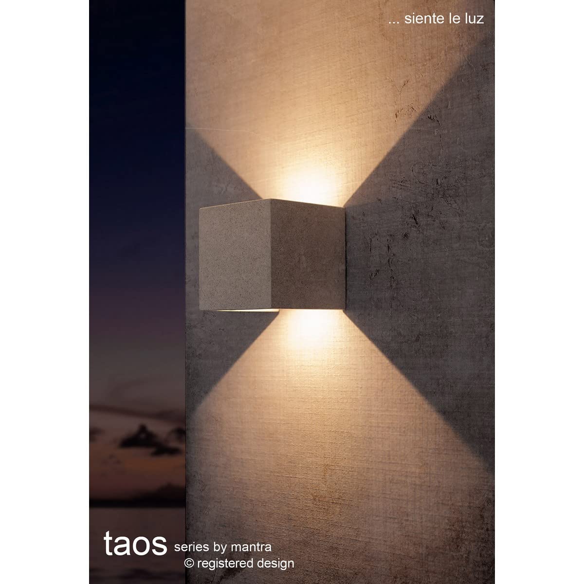 Mantra Iluminación. Modello TAOS. Applique da esterno da 12 cm realizzato in cemento finito di colore bianco