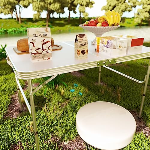 Table de camping pliable aluminium reglable pour eviter les sols instables