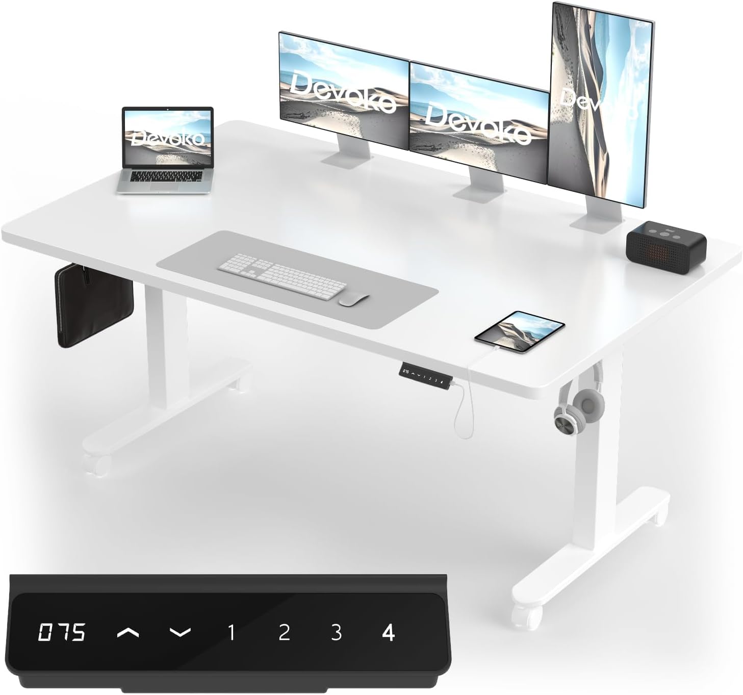 Devoko Electric Height Adjustable Desk in white with multiple monitors, laptop, and accessories.