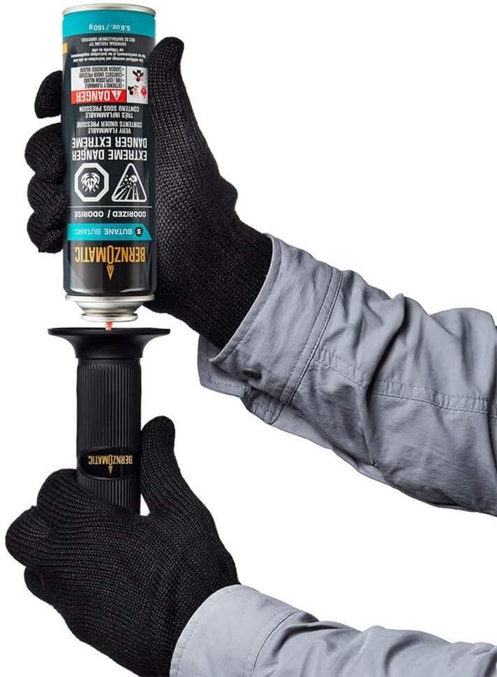 Person refilling a butane-powered device with a Bernzomatic Butane Cylinder.