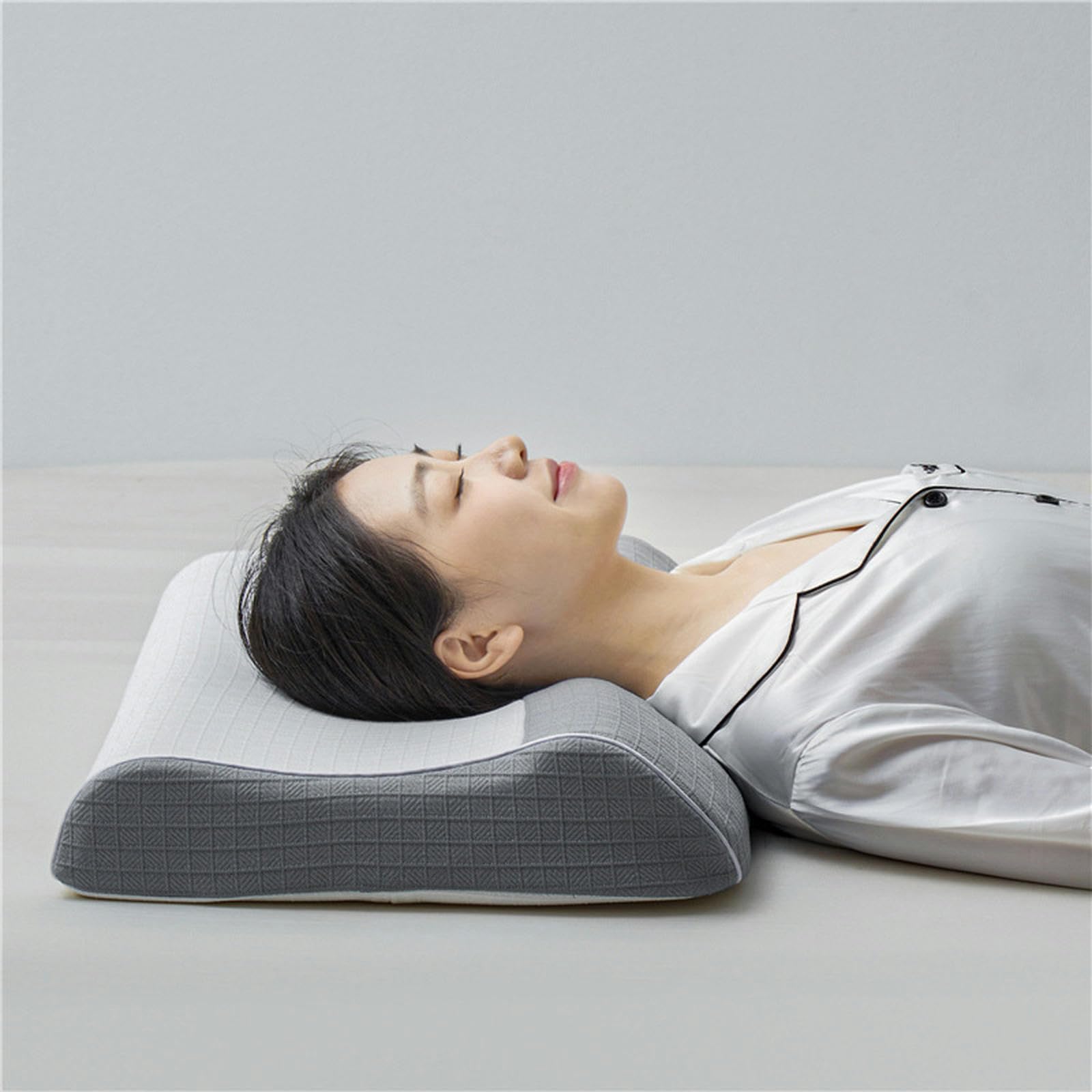 Oreiller latex traction cou pour soulager les tensions cervicales avec housse lavable