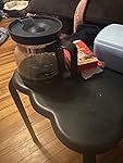 Review Image by L shaped couch. This was so poorly made that the springs are sticking through it in the box. The screws were just thrown in the box and snagged the thread on the left arm of the chair. I am 100% disabled and can not disassemble the package and I was hoping the company can do a pick up as I can not. I am in a wherlchair