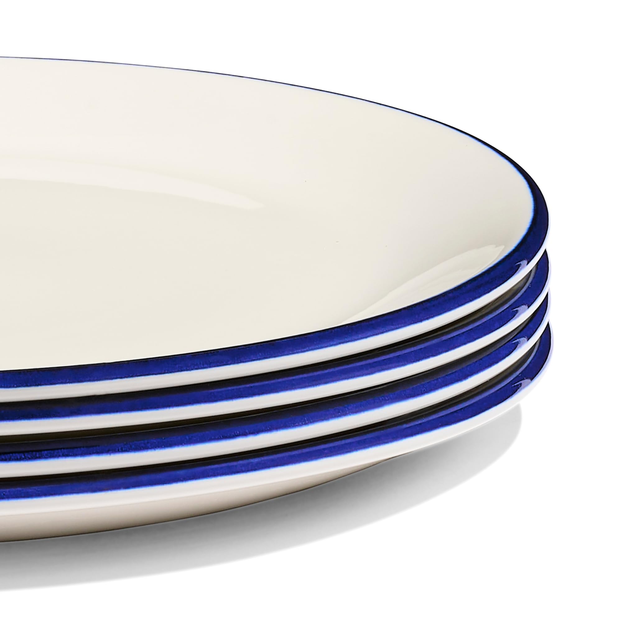 Made In Cookware - Platos llanos de 11 pulgadas, juego de 4, color blanco con borde azul marino, porcelana, fabricados en Inglaterra
