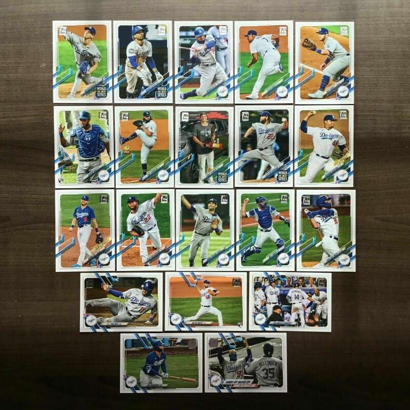 2021 Topps Series 1 Baseball Los Angeles Dodgers Base MLB Hand Collated Team Set in Near Mint to Mint Condition of 20 Cards:5 Julio Urias - 13 Mookie Betts - 15 Mookie Betts World Series Highlights (WSH) - 40 Joc Pederson - 44 Walker Buehler WSH - 50 Cody Bellinger 57 Will Smith - 64 Chris Taylor - 67 Clayton Kershaw - 83 Gavin Lux Future Stars - 85 Brusdar Graterol Future Stars - 179 Clayton Kershaw WSH 198 Corey Seager WSH - 201 Los Angeles Dodgers Team Card - 230 Tony Gonsolin – Rookie