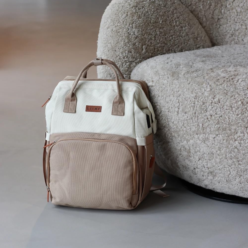LIINI Sac à dos à langer beige rPET - 29 l - En bouteilles PET recyclées - Compartiment imperméable pour vêtements mouillés - Compartiments pour bouteilles isolés - Avec matelas à langer et crochets