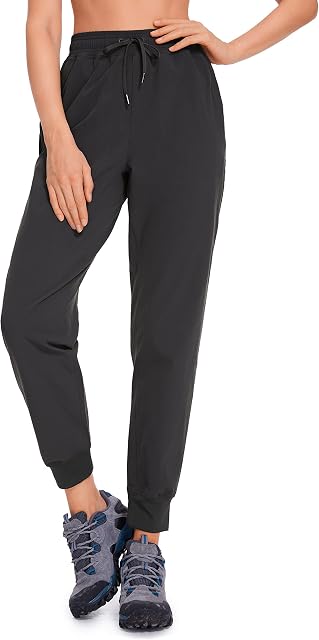 CRZ YOGA Calça jogger feminina à prova d'água para atividades ao ar livre, golfe, atlética, leve, com bolsos com zíper, 68,5 cm