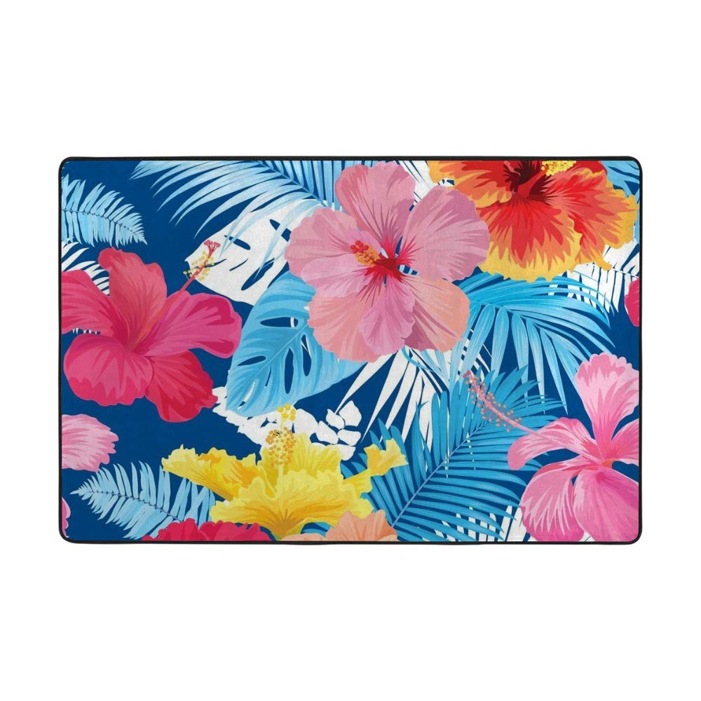 Tapis de salon exotique avec motif de feuilles pour une ambiance de voyage