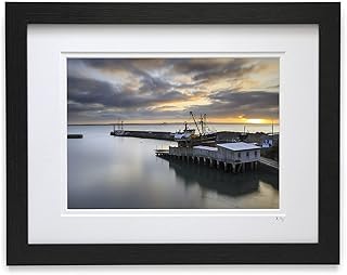 Mounted or framed photograph by Andrew Ray featuring a sunrise at Newlyn Harbour in Cornwall.