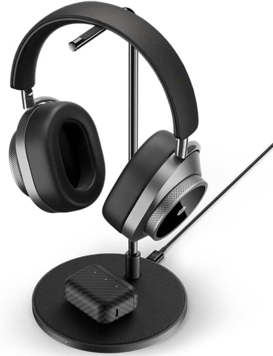 Headphones on stand with device wirelessly charging