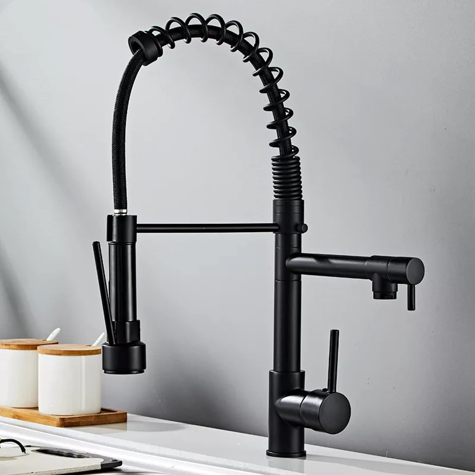 Mitigeur de cuisine en cuivre avec ressort et double bec au design chromé intemporel