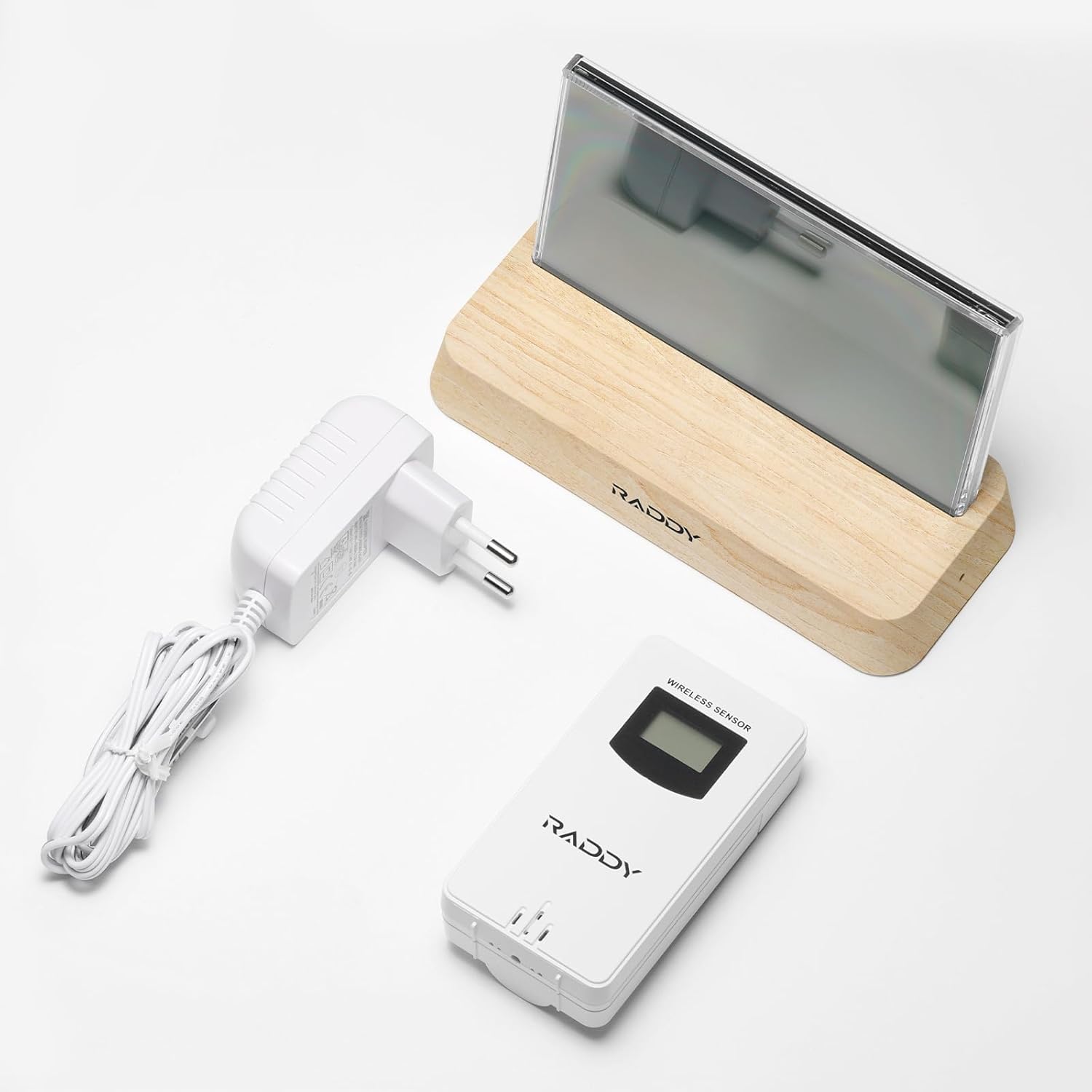 Raddy DT6 Weather Station components: main unit, sensor, power adapter