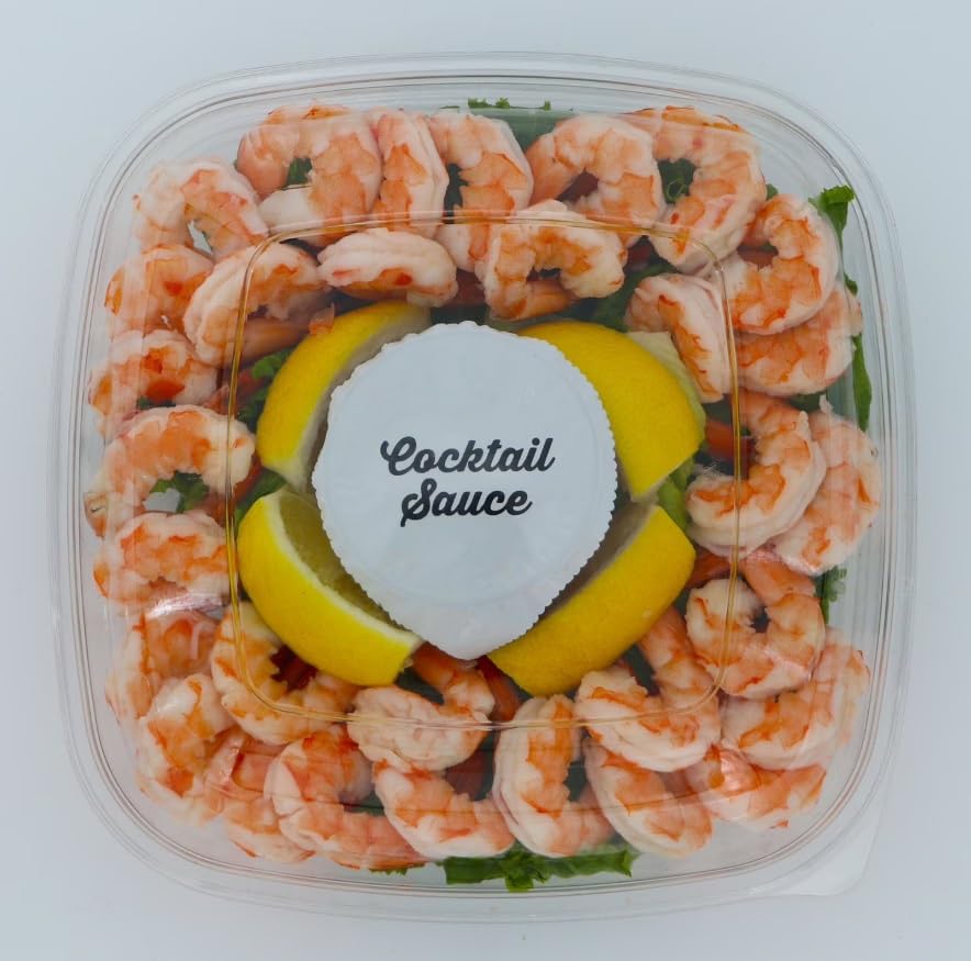 Shrimp Tray with Cocktail Sauce, Shrimp and zesty cocktail sauce in a party ready tray,It’s accompanied by fresh lemon wedges, adding a tangy twist to the dish. 1.5 POUND