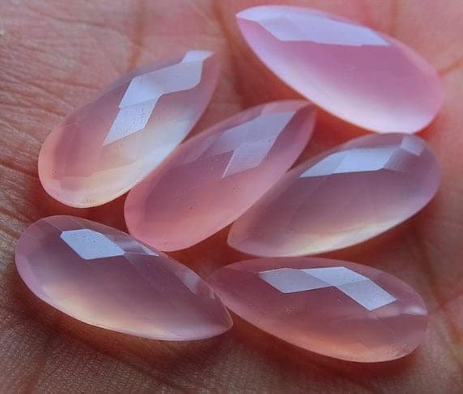 Calcédoine rose facettée en briolette poire longue 8x20mm pour création LKBEADS de 3 paires assorties
