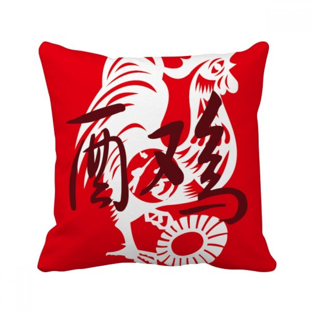 Coussin Coq pour raviver un canapé terne avec ses couleurs vives