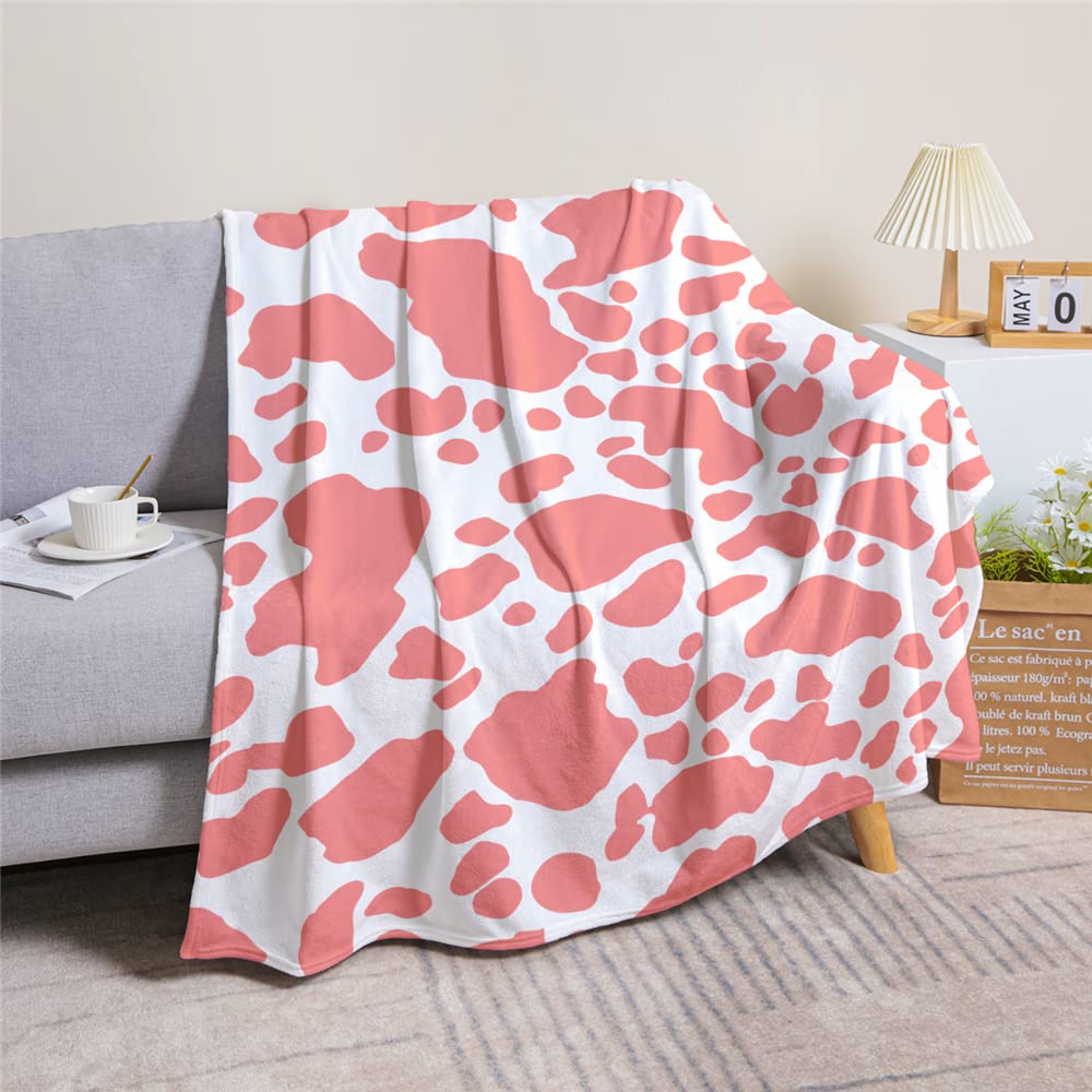 Plaid en flanelle vache rose jeté de lit douillet pour une ambiance douce et réconfortante
