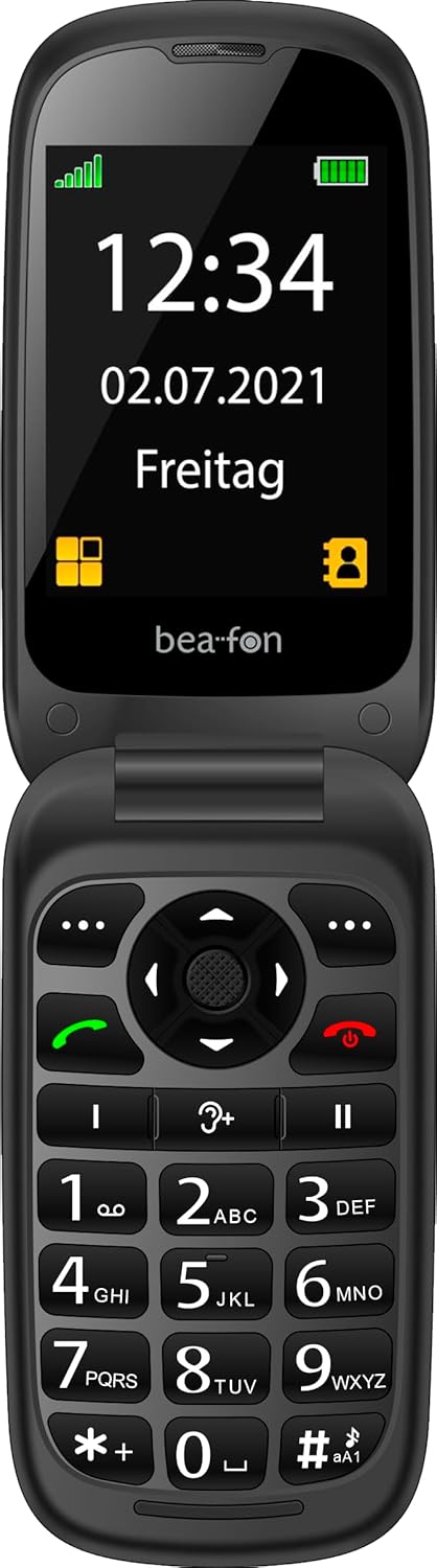 Beafon SL720 flip phone open, displaying time and date on the main screen.