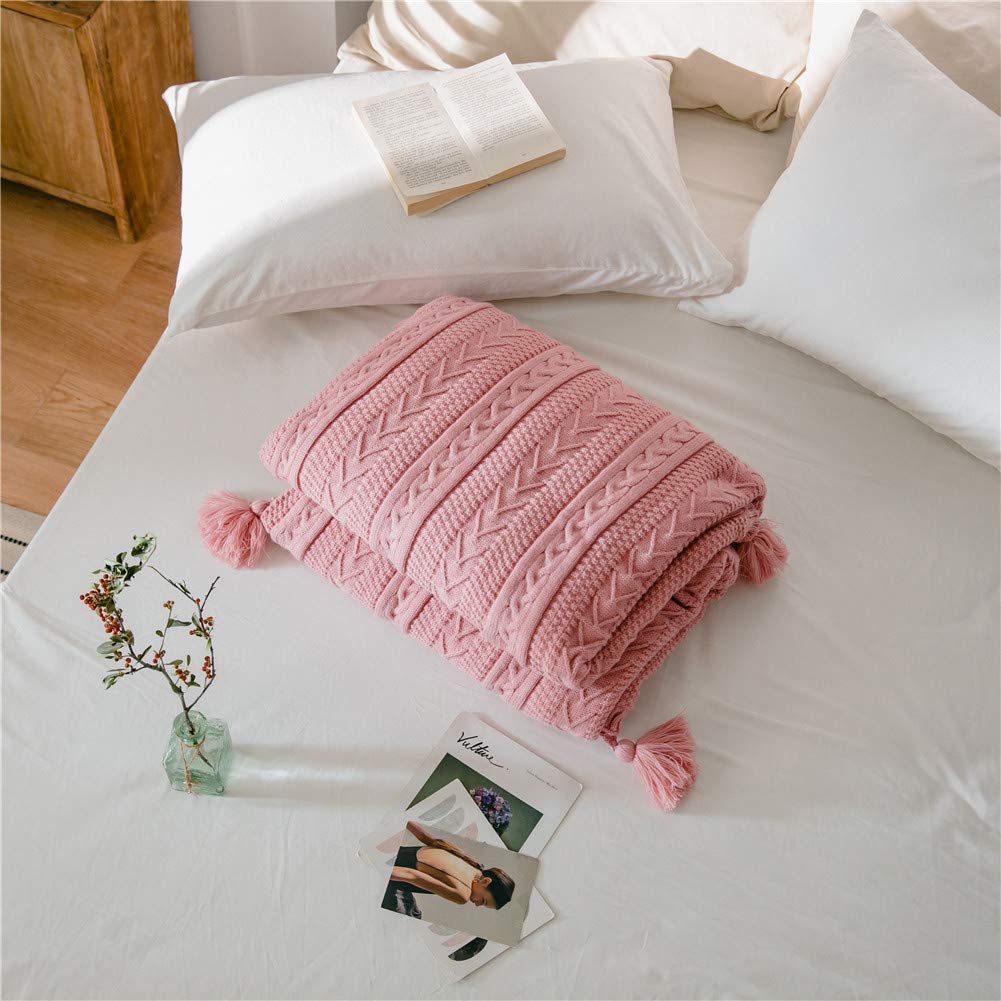 Couverture à pompons tricotée main rose pour réchauffer vos nuits