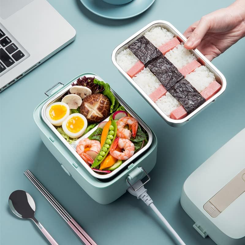 A green Bear Electric Lunch Box plugged into power, with its lid open, showing a stainless steel container filled with various foods like shrimp, eggs, and vegetables.