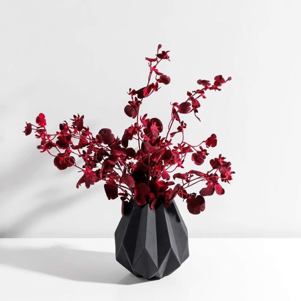 Arrangement surface lisse céramique : le vase idéal contre les bureaux ternes