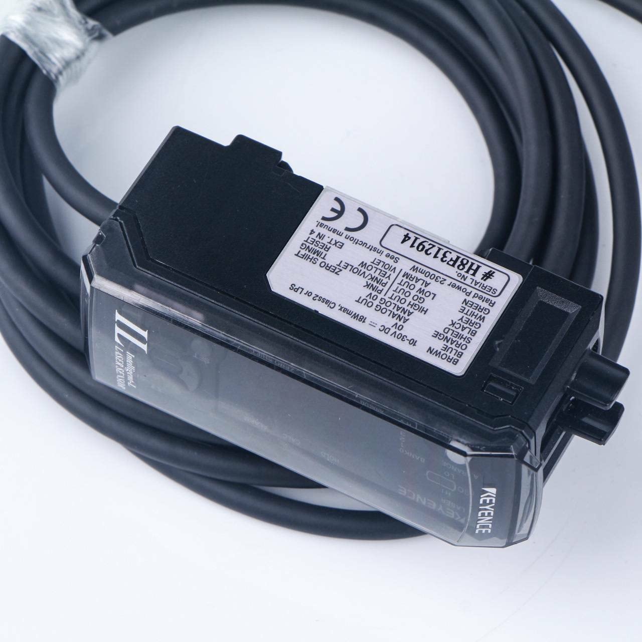 Close-up view of the KEYENCE IL-1000 Laser Amplifier's product label