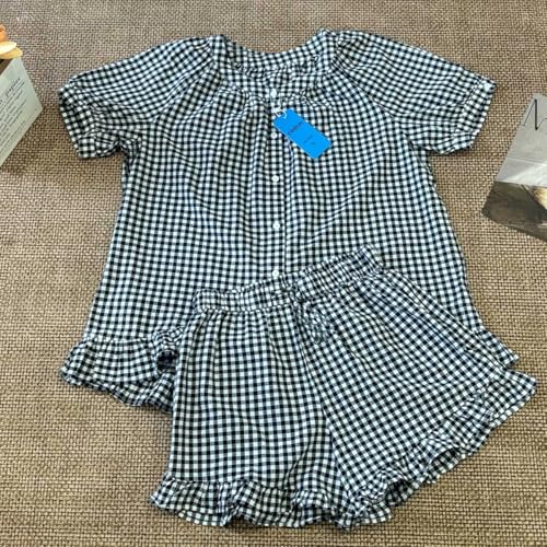 Image of codcm Womens 2 Piece Ruffle Pajama Set Gingham Pjs Short Sleeve Babydoll Shirt and Shorts Plaid Summer Outfits