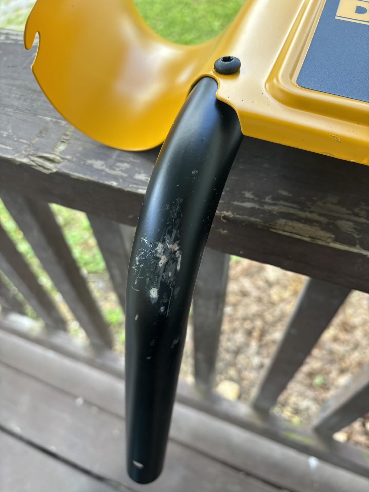 DeWalt DXPW3300-S on driveway outdoor use photo with "Tackle the Tough Jobs" branding visible