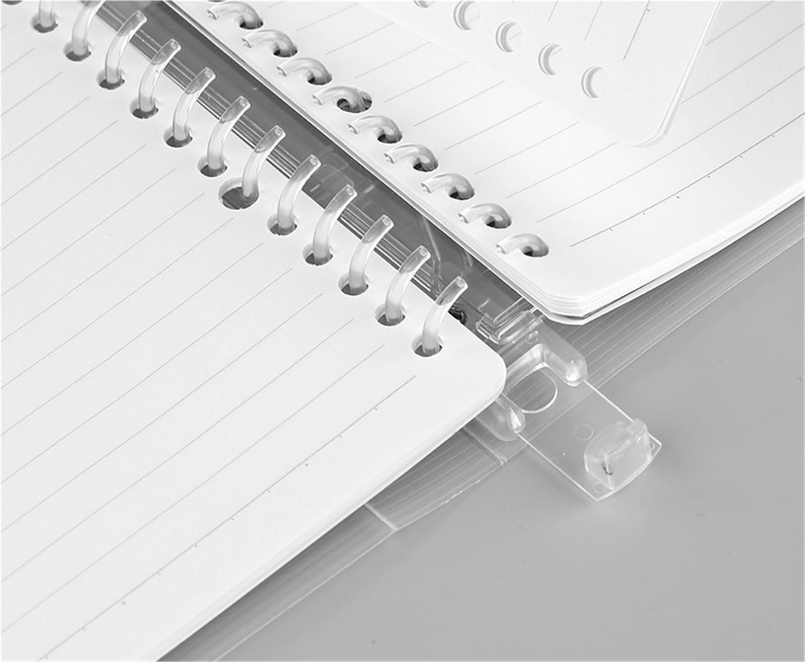 1 carnet de notes à feuilles mobiles pastel.