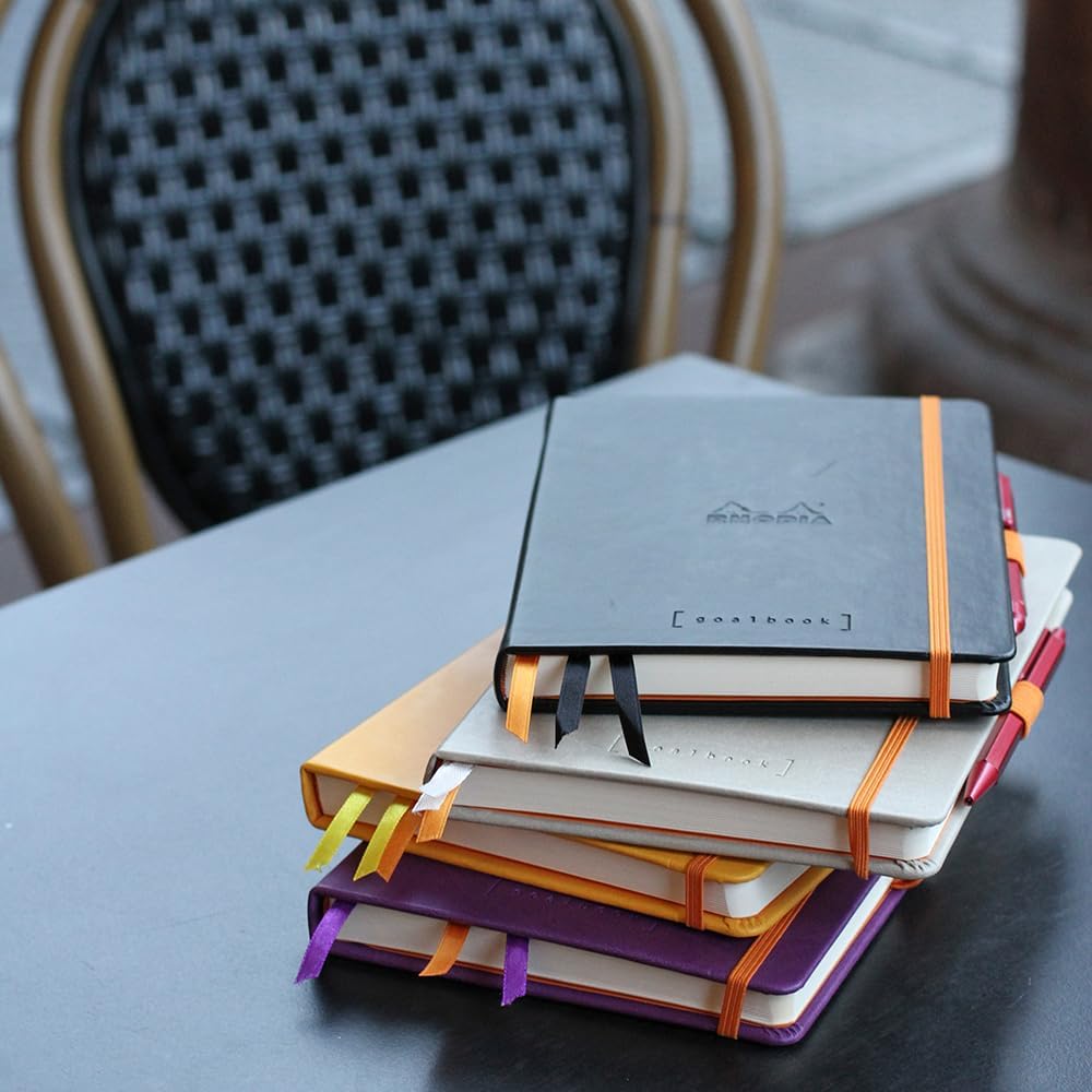 Rhodia 118780C - Bullet Journal Goalbook Rigid Notebook Purple - A5 - Dotted Dot - 240 Pages - 90g Ivory Clairefontaine Paper - 3 Ribbons, Elastic Closure - Faux Leather Cover