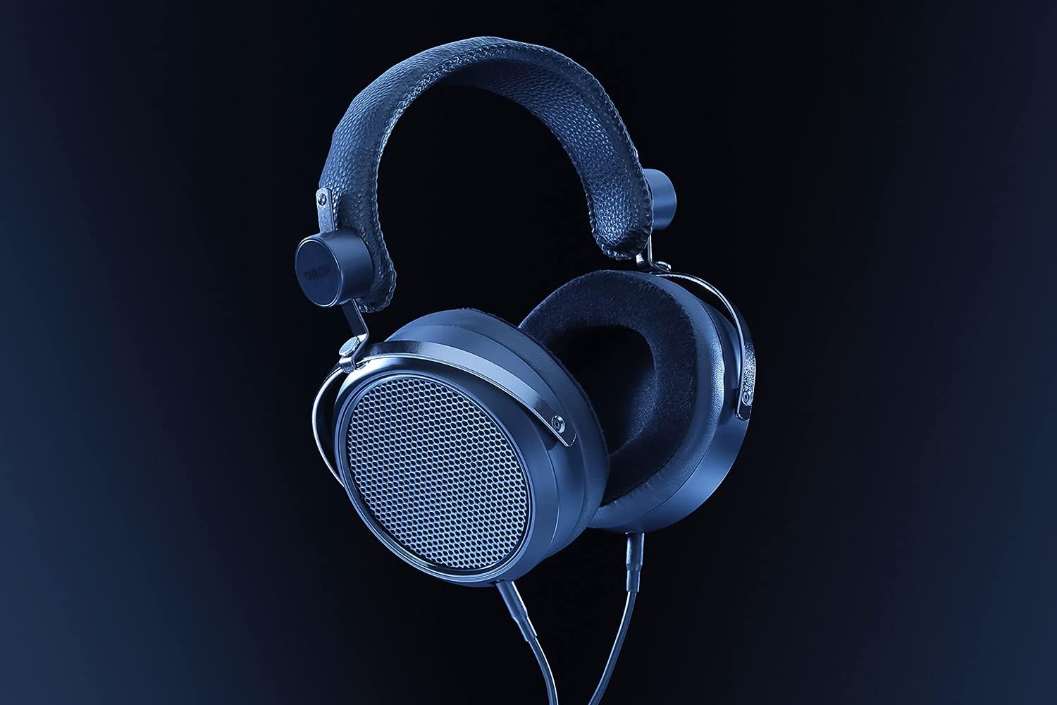 Close-up of the plush ear pad of the HE-X4 headphones.