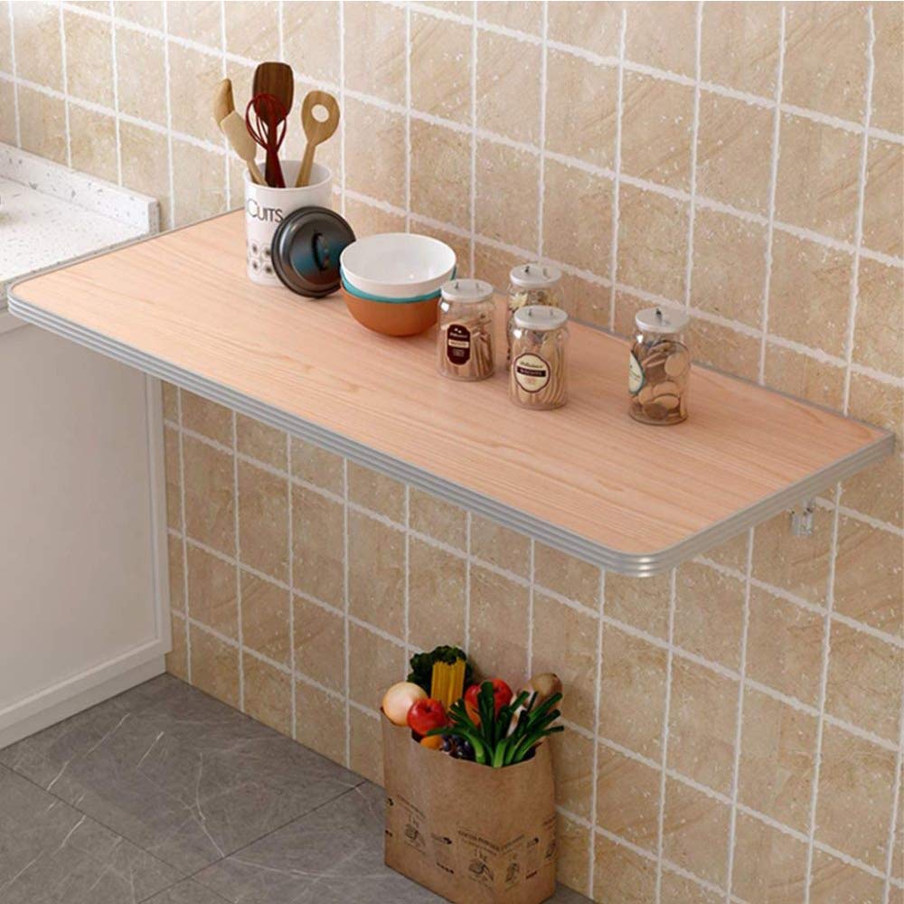 Dressing à domicile compact et table pliable murale pour optimiser les petits espaces