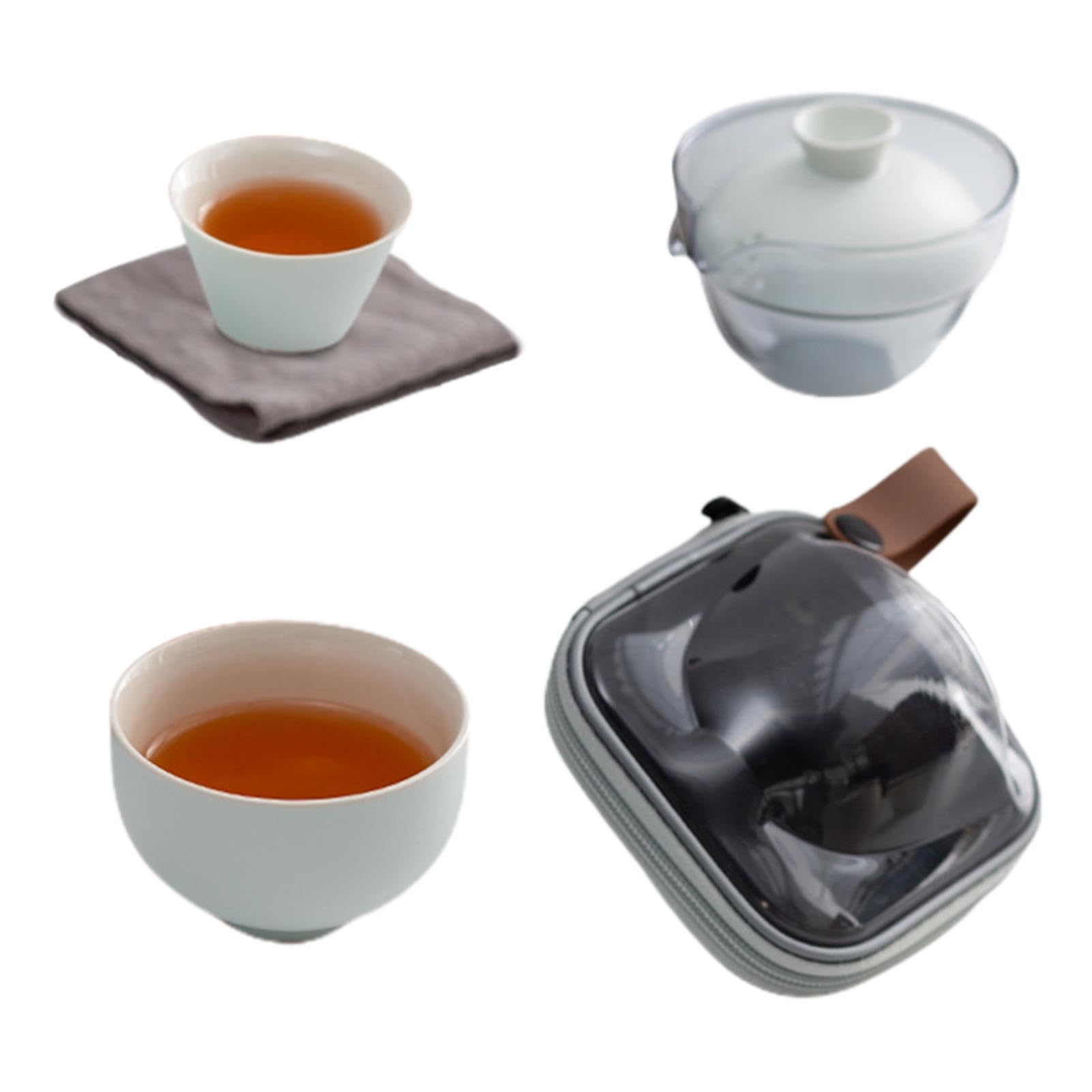 Tasses à thé et théière en céramique fine pour un service de voyage