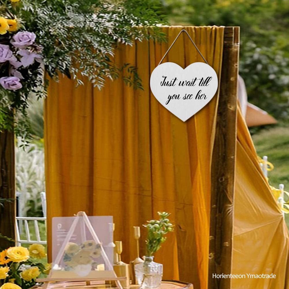 Just wait till you see her wedding sign | Beachweddingtips.com