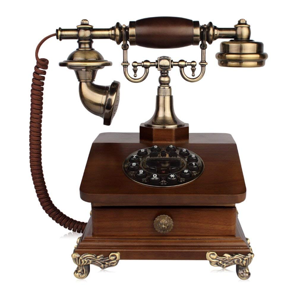 Téléphone fixe rétro mécanique idéal pour sublimer le buffet d'un salon vintage