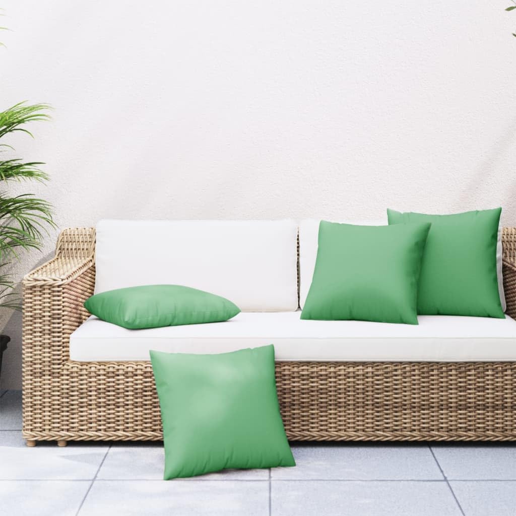 Coussins de canapé extérieur vert pour aménager votre terrasse d'été
